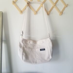 NWOT FASHION INSTINCT CREAMY WHITE CROSSBODY PURSE WITH CORD CASE